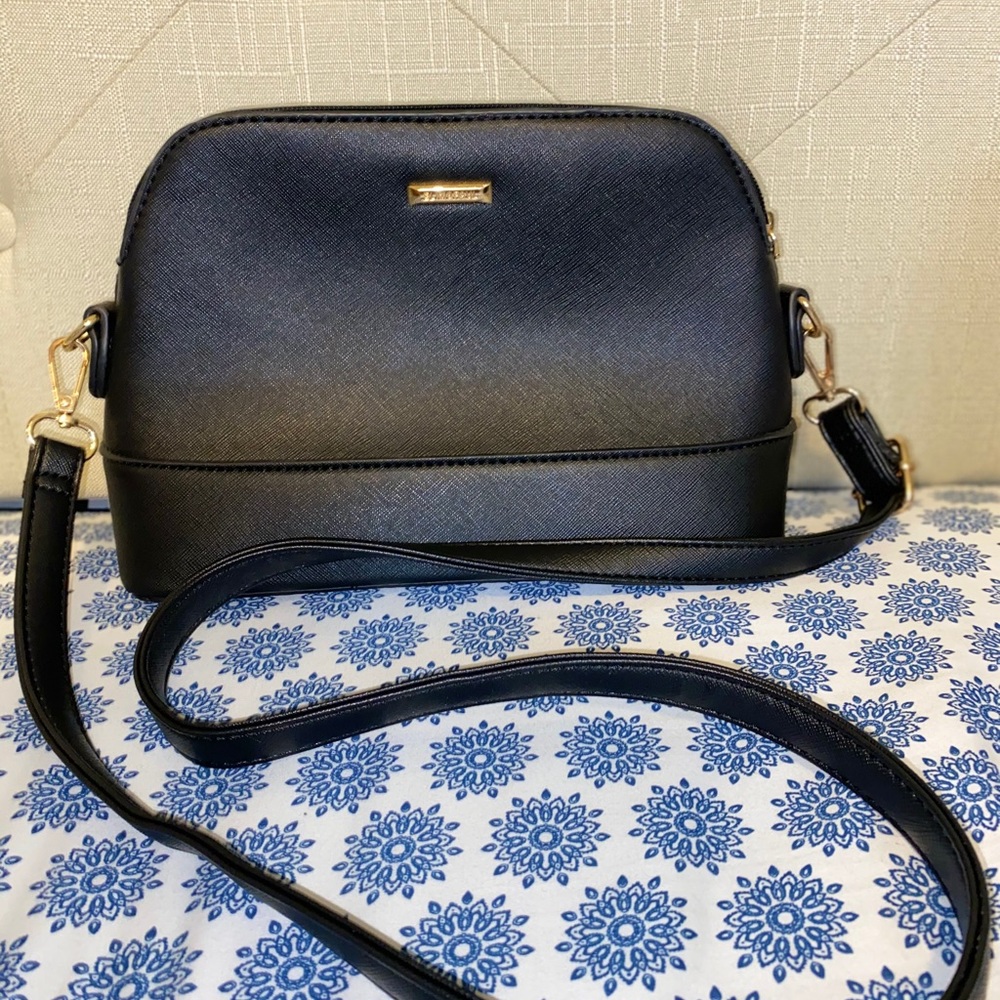 black over the shoulder cross body. lightly used.